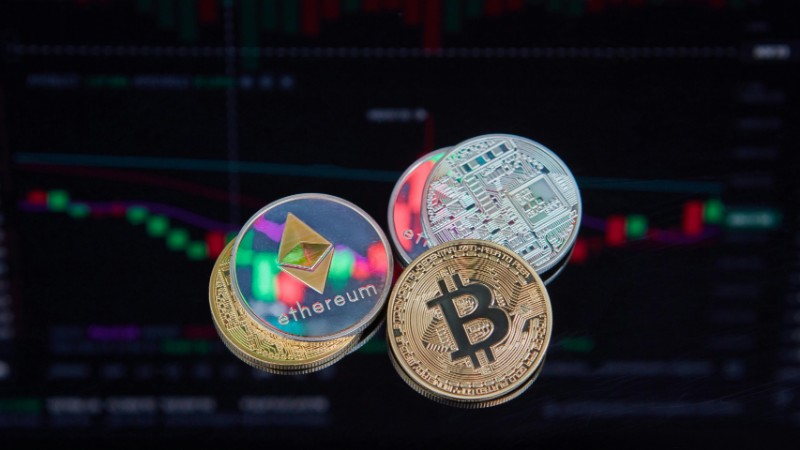Floating Bitcoin and Ethereum coins with a market trend chart in the background symbolizing digital finance., tags: federal reserve's - pexel